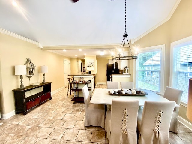 29 Frank Fwy, Iuka, MS 38852 - dining space with a chandelier, ornamental molding, vaulted ceiling, baseboards, and recessed lighting