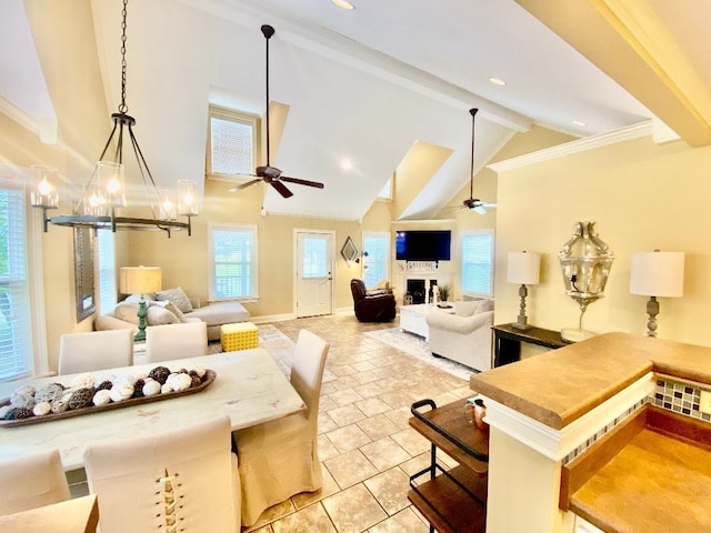 29 Frank Fwy, Iuka, MS 38852 - living room with a ceiling fan, beamed ceiling, a chandelier, light tile patterned flooring, and high vaulted ceiling