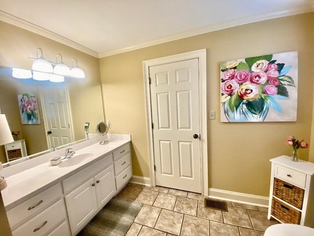 29 Frank Fwy, Iuka, MS 38852 - bathroom featuring baseboards, vanity, crown molding, and tile patterned flooring