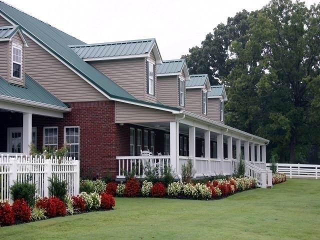 29 Frank Fwy, Iuka, MS 38852 - view of home's exterior with metal roof and brick siding
