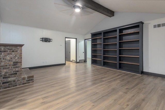 268 Tara Cv, Hernando, MS 38632 - unfurnished living room with a ceiling fan, wood finished floors, and baseboards