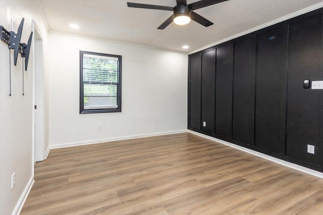 268 Tara Cv, Hernando, MS 38632 - unfurnished bedroom with light wood-type flooring, baseboards, crown molding, recessed lighting, and a ceiling fan