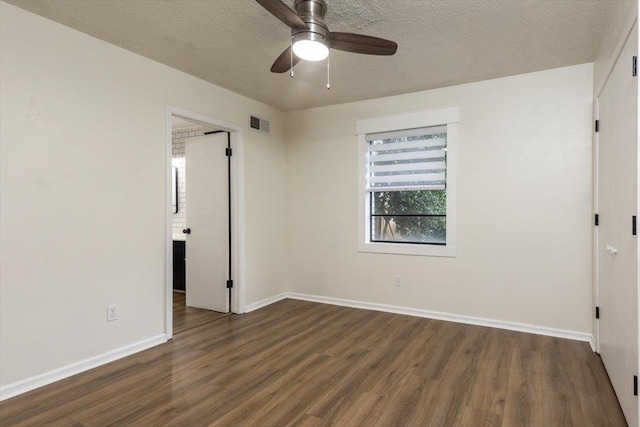 268 Tara Cv, Hernando, MS 38632 - empty room with wood finished floors, baseboards, a ceiling fan, and a textured ceiling