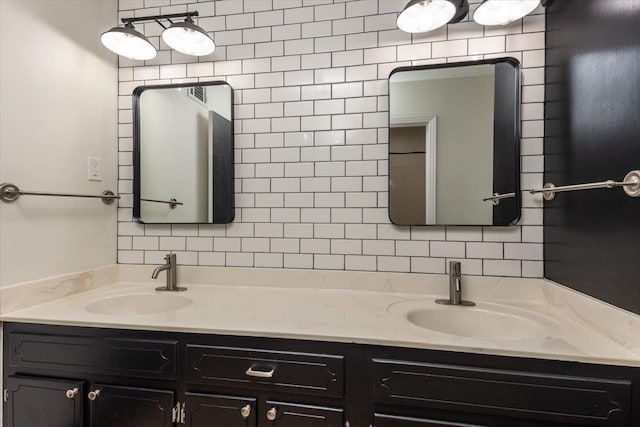 268 Tara Cv, Hernando, MS 38632 - bathroom with tasteful backsplash and double vanity