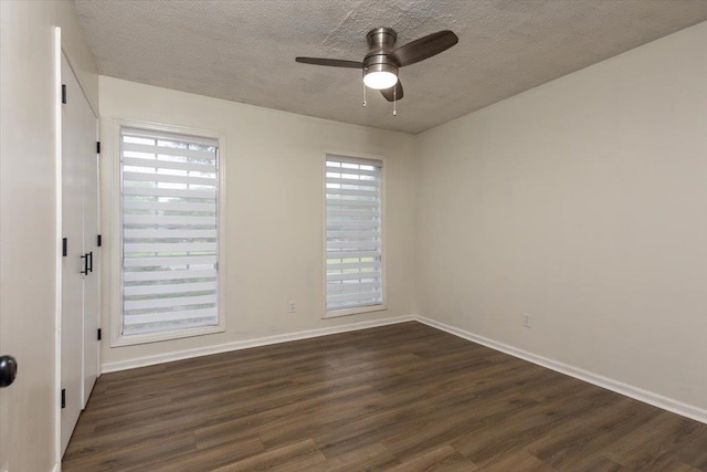 268 Tara Cv, Hernando, MS 38632 - unfurnished room featuring dark wood finished floors, a ceiling fan, plenty of natural light, baseboards, and a textured ceiling