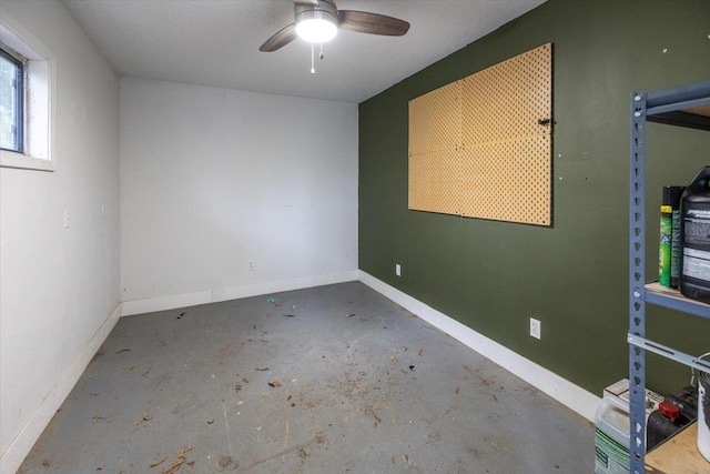 268 Tara Cv, Hernando, MS 38632 - unfurnished room featuring unfinished concrete floors, ceiling fan, and baseboards