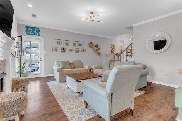 12262 Kathleen Cv, Arlington, TN 38002 - living room featuring stairway, ornamental molding, a chandelier, baseboards, and dark wood finished floors