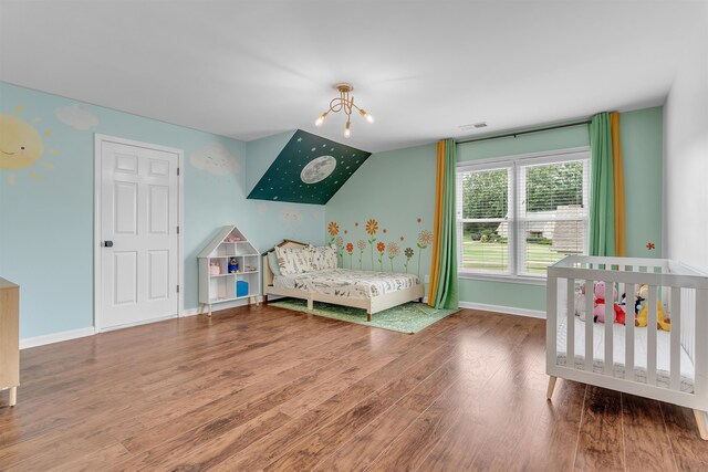 12262 Kathleen Cv, Arlington, TN 38002 - bedroom with wood finished floors and baseboards