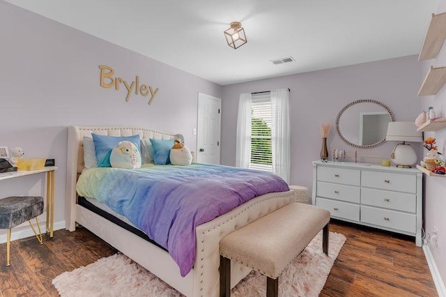 12262 Kathleen Cv, Arlington, TN 38002 - bedroom featuring dark wood-style flooring and baseboards