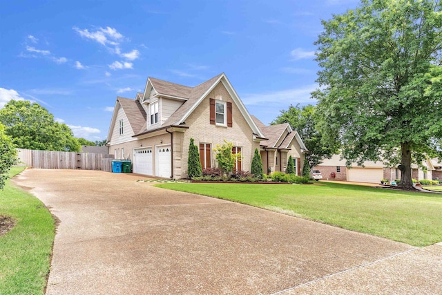 12262 Kathleen Cv, Arlington, TN 38002 - traditional-style house featuring brick siding, driveway, an attached garage, and a shingled roof
