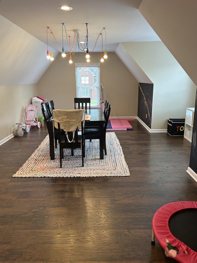 12262 Kathleen Cv, Arlington, TN 38002 - dining area with baseboards, lofted ceiling, wood finished floors, and a chandelier
