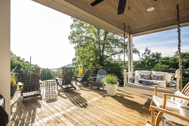 8 Shady Oak Cv, Iuka, MS 38852 - deck with ceiling fan and an outdoor living space
