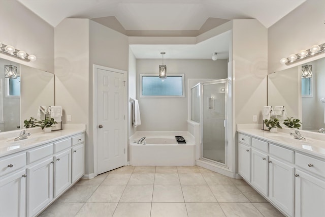 9071 E Tefall Cv, Cordova, TN 38016 - full bathroom featuring a shower stall, two vanities, a garden tub, and tile patterned flooring