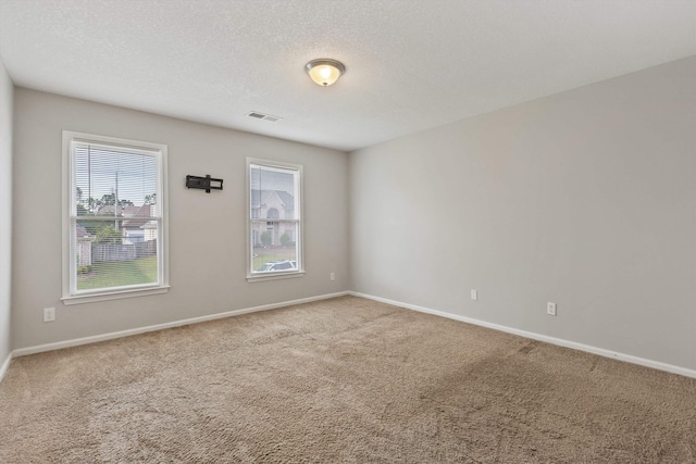 9071 E Tefall Cv, Cordova, TN 38016 - carpeted spare room with baseboards and a textured ceiling