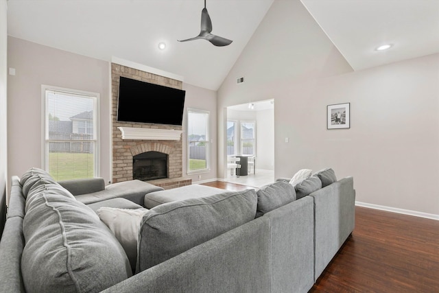 9071 E Tefall Cv, Cordova, TN 38016 - living room with ceiling fan, baseboards, dark wood-style flooring, healthy amount of natural light, and high vaulted ceiling