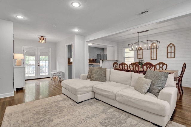 624 N Oak Grove Rd N, Memphis, TN 38120 - living room featuring wood finished floors, french doors, a chandelier, baseboards, and recessed lighting