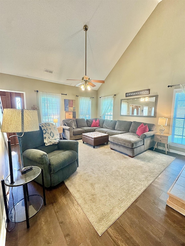 150 Westwood Cir, Ripley, TN 38063 - living room with wood finished floors, ceiling fan, high vaulted ceiling, and a textured ceiling
