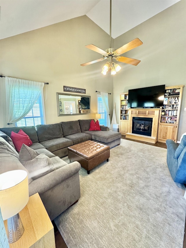 150 Westwood Cir, Ripley, TN 38063 - carpeted living room with high vaulted ceiling, ceiling fan, and a glass covered fireplace