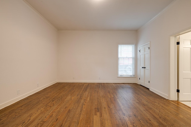 228 Palisade St, Memphis, TN 38111 - empty room with wood finished floors, crown molding, and baseboards