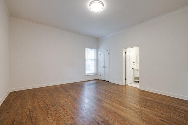 228 Palisade St, Memphis, TN 38111 - unfurnished room with ornamental molding, dark wood-type flooring, and baseboards