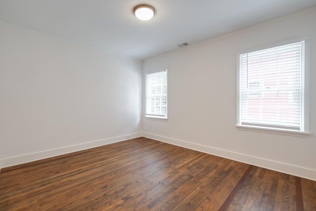 228 Palisade St, Memphis, TN 38111 - empty room with baseboards, dark wood-style flooring, and ornamental molding