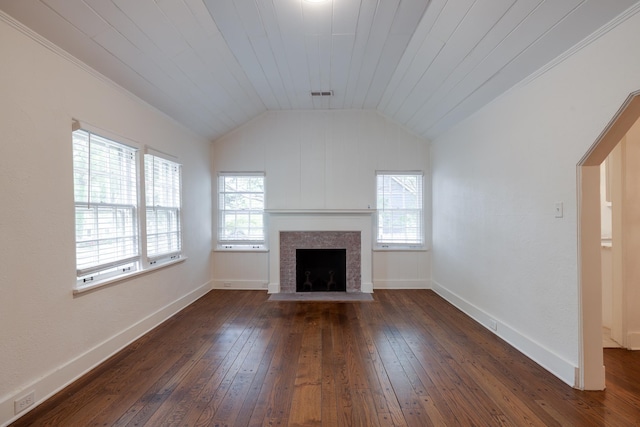 228 Palisade St, Memphis, TN 38111 - unfurnished living room featuring dark wood-style flooring, a fireplace with flush hearth, healthy amount of natural light, baseboards, and vaulted ceiling