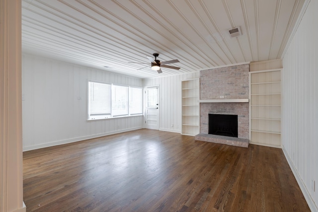 228 Palisade St, Memphis, TN 38111 - unfurnished living room with a fireplace, built in features, ceiling fan, dark wood-style flooring, and baseboards