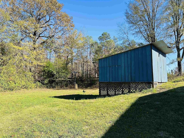 1145 Cypress Tank Rd, Pocahontas, TN 38061 - view of green lawn featuring an outdoor structure