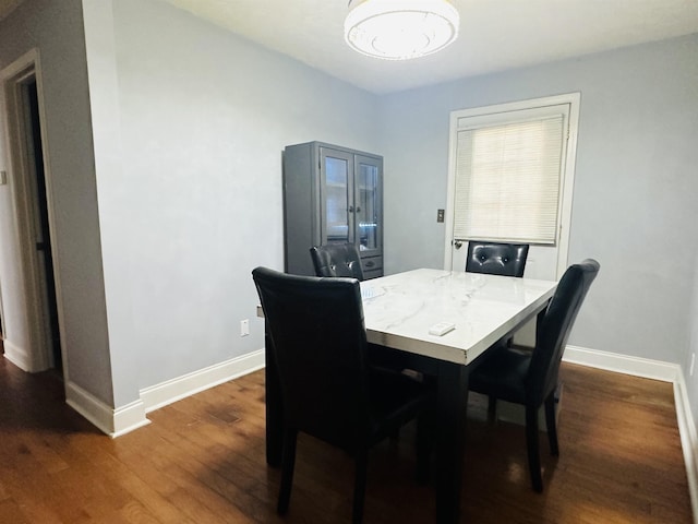 1145 Cypress Tank Rd, Pocahontas, TN 38061 - dining space with dark wood-type flooring and baseboards