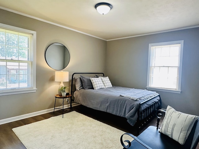159 Hillhurst Dr, Selmer, TN 38375 - bedroom featuring crown molding, baseboards, and dark wood finished floors