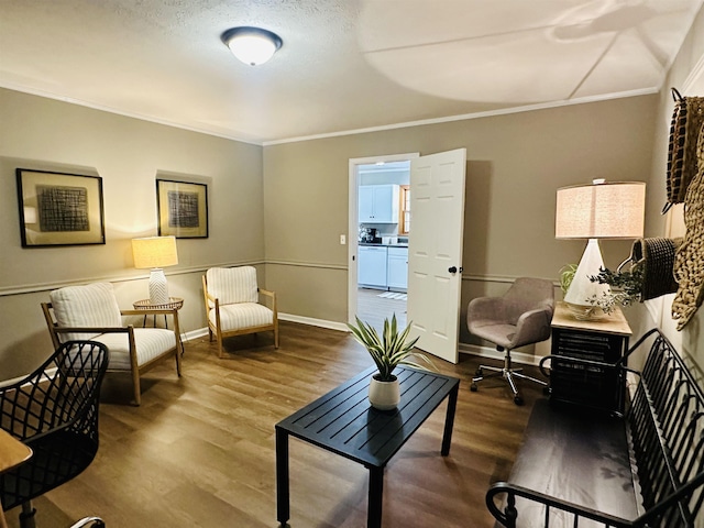 159 Hillhurst Dr, Selmer, TN 38375 - living area with crown molding, wood finished floors, and baseboards