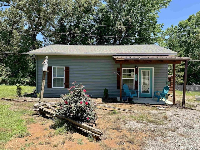 159 Hillhurst Dr, Selmer, TN 38375 - view of front of property with covered porch and roof with shingles