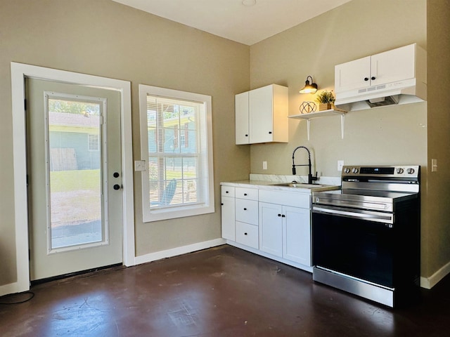 159 Hillhurst Dr, Selmer, TN 38375 - kitchen with stainless steel range with electric stovetop, a sink, finished concrete floors, under cabinet range hood, and white cabinets