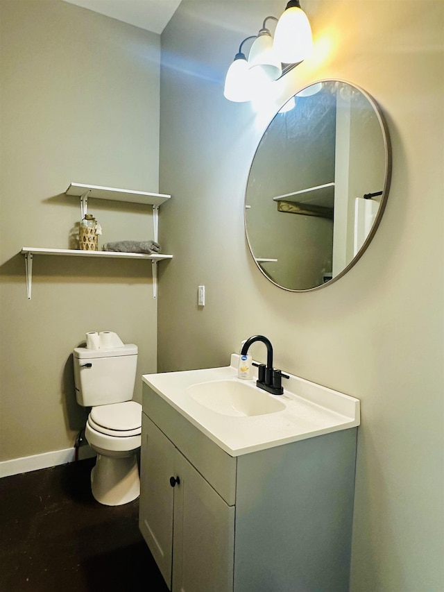 159 Hillhurst Dr, Selmer, TN 38375 - bathroom with vanity, toilet, and baseboards