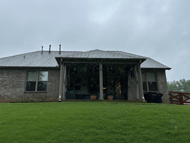 6104 Scottscraig Cv, Bartlett, TN 38135 - rear view of house featuring a yard, brick siding, and a shingled roof
