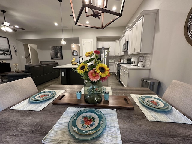 6104 Scottscraig Cv, Bartlett, TN 38135 - dining room featuring ceiling fan, recessed lighting, dark wood finished floors, and a chandelier