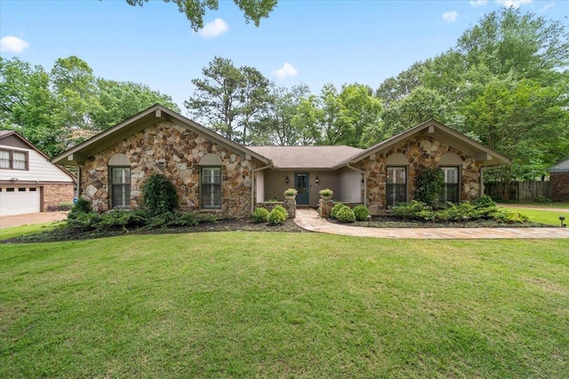 1772 Old Mill Rd, Germantown, TN 38138 - view of front of house with stone siding, a front lawn, and a garage