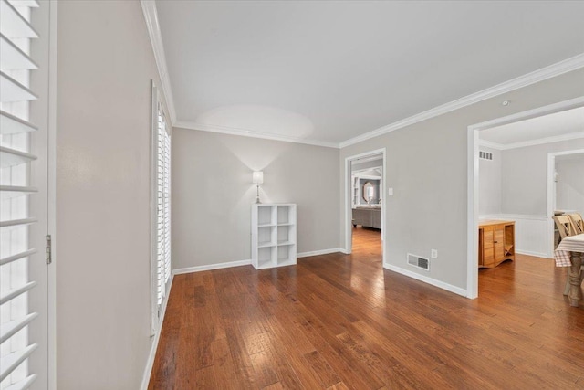 1772 Old Mill Rd, Germantown, TN 38138 - unfurnished room featuring wood finished floors, crown molding, and baseboards
