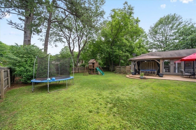 1772 Old Mill Rd, Germantown, TN 38138 - view of yard featuring a trampoline, a gazebo, a playground, and a patio
