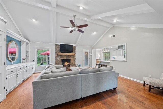 1772 Old Mill Rd, Germantown, TN 38138 - living area featuring a stone fireplace, ceiling fan, light wood-type flooring, baseboards, and recessed lighting