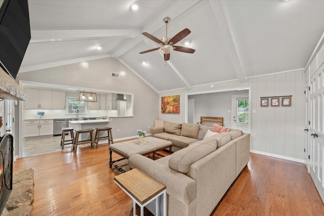 1772 Old Mill Rd, Germantown, TN 38138 - living area with light wood-style flooring, a ceiling fan, and baseboards