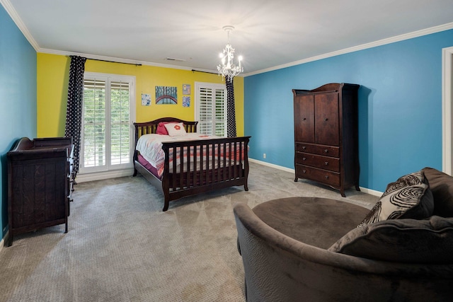 415 S Yates Cv, Memphis, TN 38120 - bedroom featuring a chandelier, ornamental molding, light carpet, and baseboards