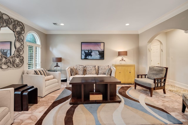 415 S Yates Cv, Memphis, TN 38120 - living room featuring arched walkways, recessed lighting, crown molding, light marble finish floors, and baseboards
