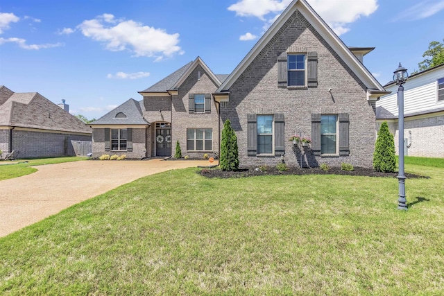9730 Woodland Fox Ln N, Cordova, TN 38018 - view of front of home with a front yard and brick siding