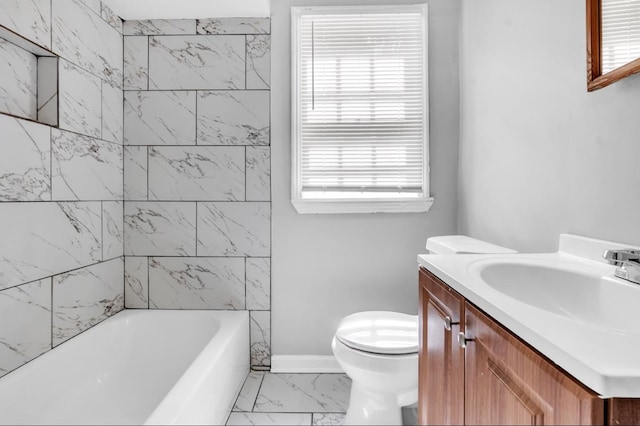 1078 E Walthal Cir, Memphis, TN 38111 - bathroom with marble look tile flooring, vanity, toilet, and plenty of natural light