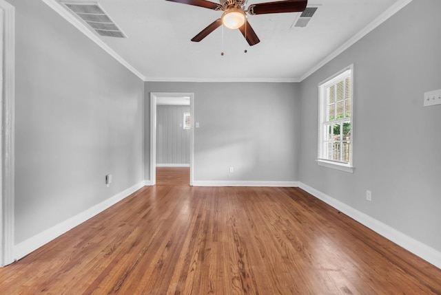 1078 E Walthal Cir, Memphis, TN 38111 - spare room featuring baseboards, wood finished floors, crown molding, and a ceiling fan