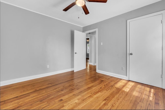 1078 E Walthal Cir, Memphis, TN 38111 - unfurnished bedroom with light wood-style flooring, baseboards, and ceiling fan