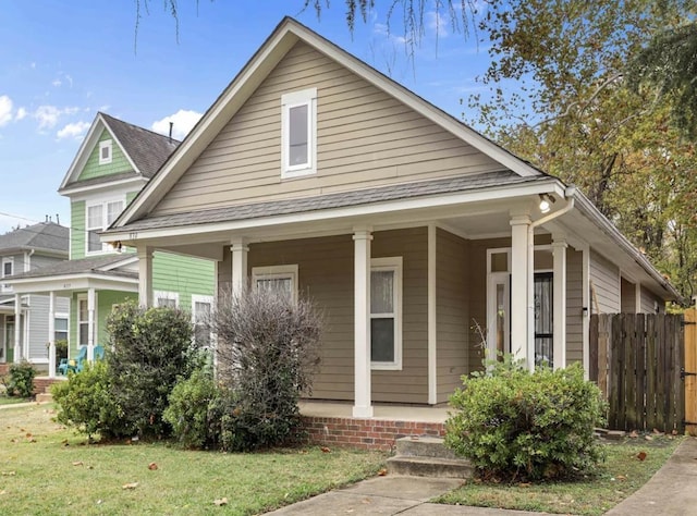 839 Woodlawn St, Memphis, TN 38107 - view of front of house featuring a porch and roof with shingles