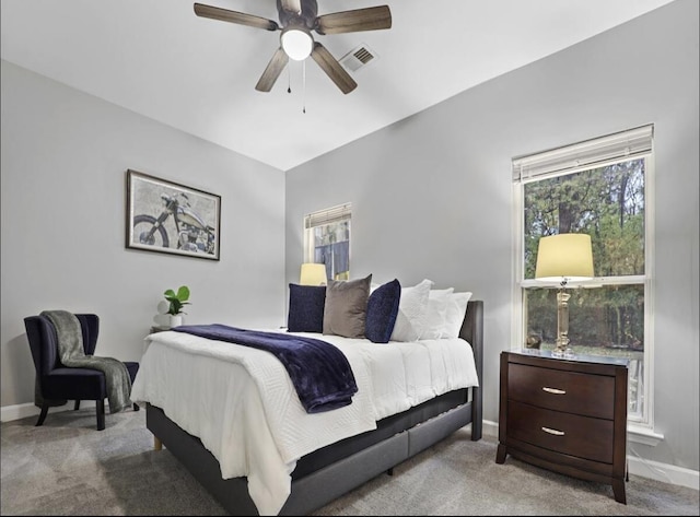 839 Woodlawn St, Memphis, TN 38107 - bedroom featuring carpet, baseboards, and multiple windows