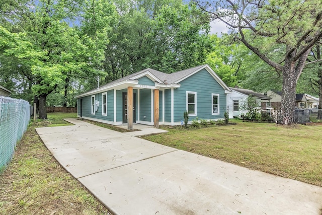 4100 New Willow Rd, Memphis, TN 38111 - bungalow-style house with concrete driveway and view of wooded area